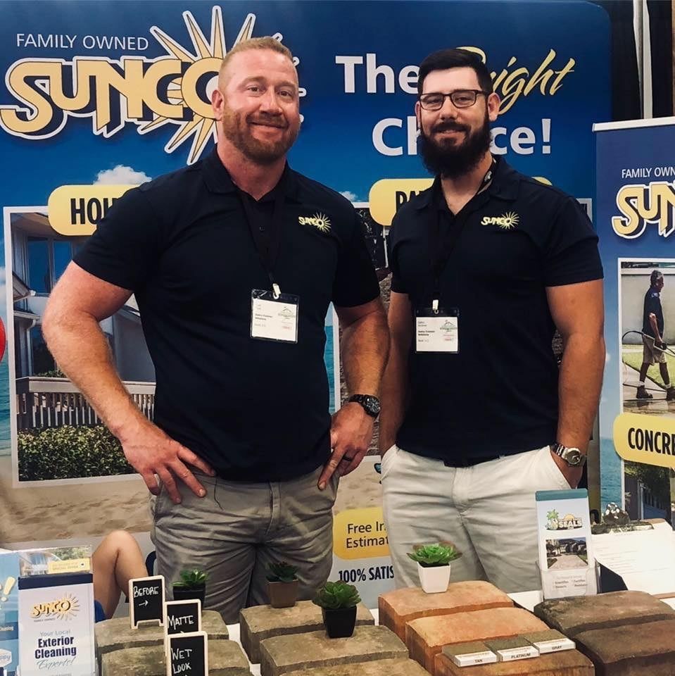 Sunco owner Brian and his manager at a local Bluffton home show.